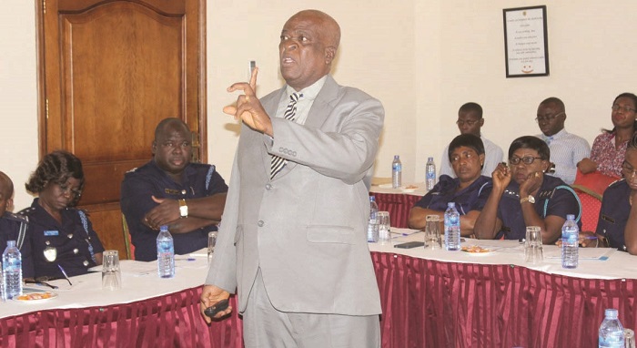 Mr. Kofi Danquah (standing), Customs Consultant, West Blue Consulting,  making a point at the programme